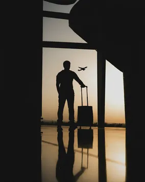 Person planning travel at airport
